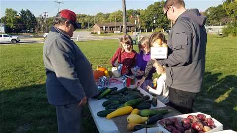 Kids at vendor table